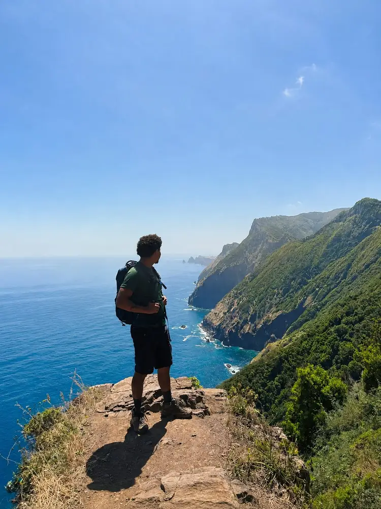 Vereda do Larano hiker looking at the coast