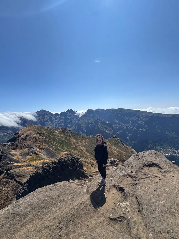 Pico Grande hiker on rocky viewpoint
