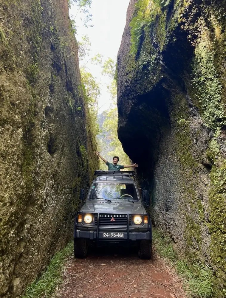 Secrets of the City 4x4 driving through a narrow rock passage