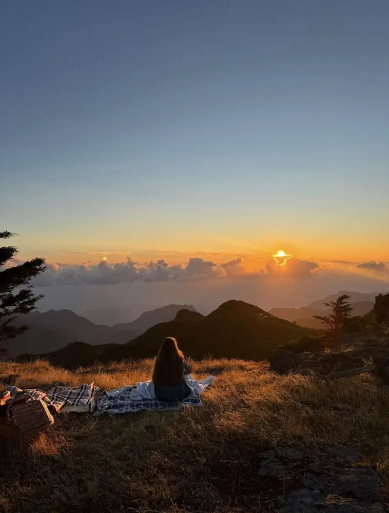 Private Sunrise picnic blanket above the clouds